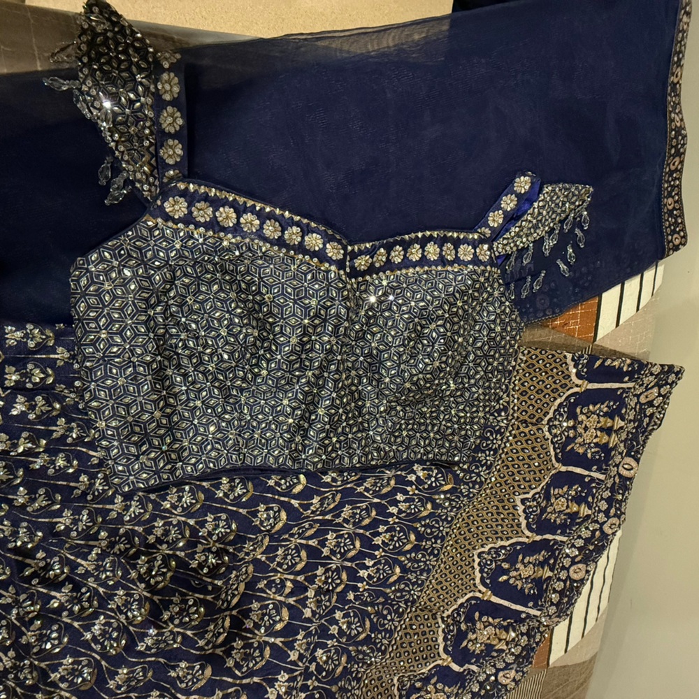 Brand new Beautiful Blue, golden with silver crystals.